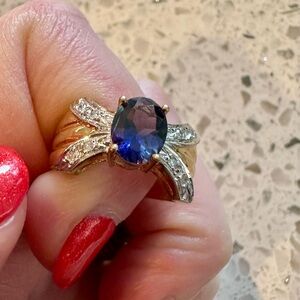 Vintage-Inspired Tanzanite Oval Ring with Diamond Accents